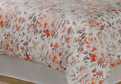 Orange, taupe, and white comforter floral pattern zoomed in